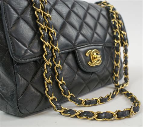 chanel black purse with gold chain|chanel black handbag chain strap.